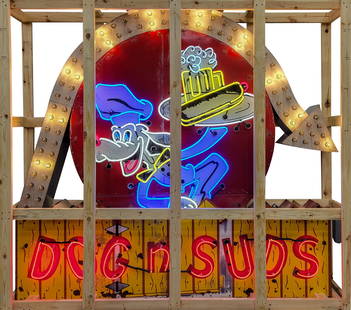 Impressive Dogs N' Suds Die Cut SSP Factory Neon Sign w/ Flashing Bulbs: 96" x 102.5" x 12", SSP multi-piece factory neon sign with die cut aluminum arrow and metal can has good color. The sign features five colors of neon with "chaser" bulbs on the arrow. The field exhibi