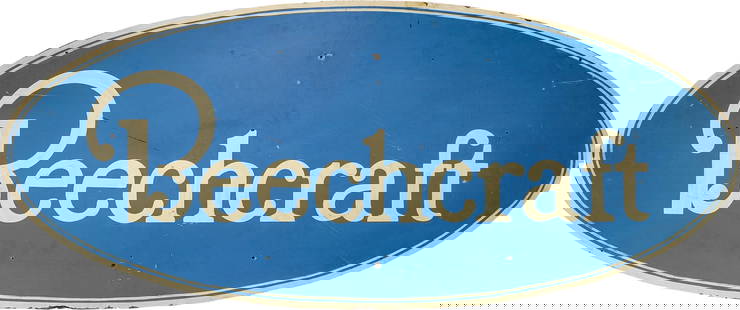 Beechcraft 72" SS Sign: 72" x 30" single-sided oval Masonite sign displays good color. There are several scratches on the surface along with multiple small non-factory holes in the field. Moderate wear is noticeable along th