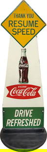 Enjoy Coca Cola Drive Refreshed "Resume Speed" DS Wooden Curb Sign: 49.5" x 18", Reflective double-sided die-cut wooden curb sign with wooden base has very good color and shine. Side #1 has light surface wear with small paint chips and areas of crackled paint. The per