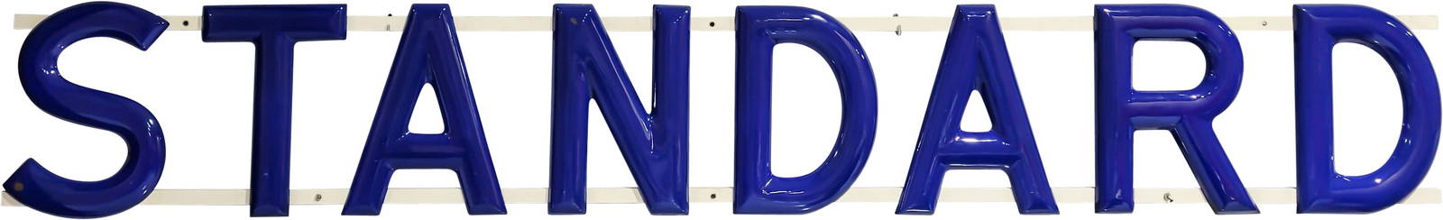 Standard Service Station 10' Single Sided Porcelain Convex Letter Sign: 18" x 120", SSP (single sided porcelain) convex letters mounted to steel channels have excellent color and gloss. The letters exhibit light wear with chips in the outer fields and edges. The steel cha