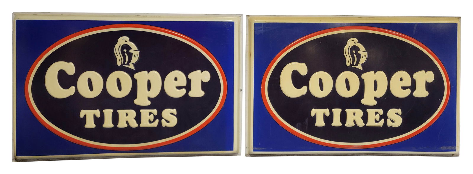 Pair of Cooper Tires Embossed Plastic Sign Skins: 73" x 48" x 3.5" each, Pair of embossed signs with logos display good color with typical signs of wear including scuffs, scratches, discoloration and toning.