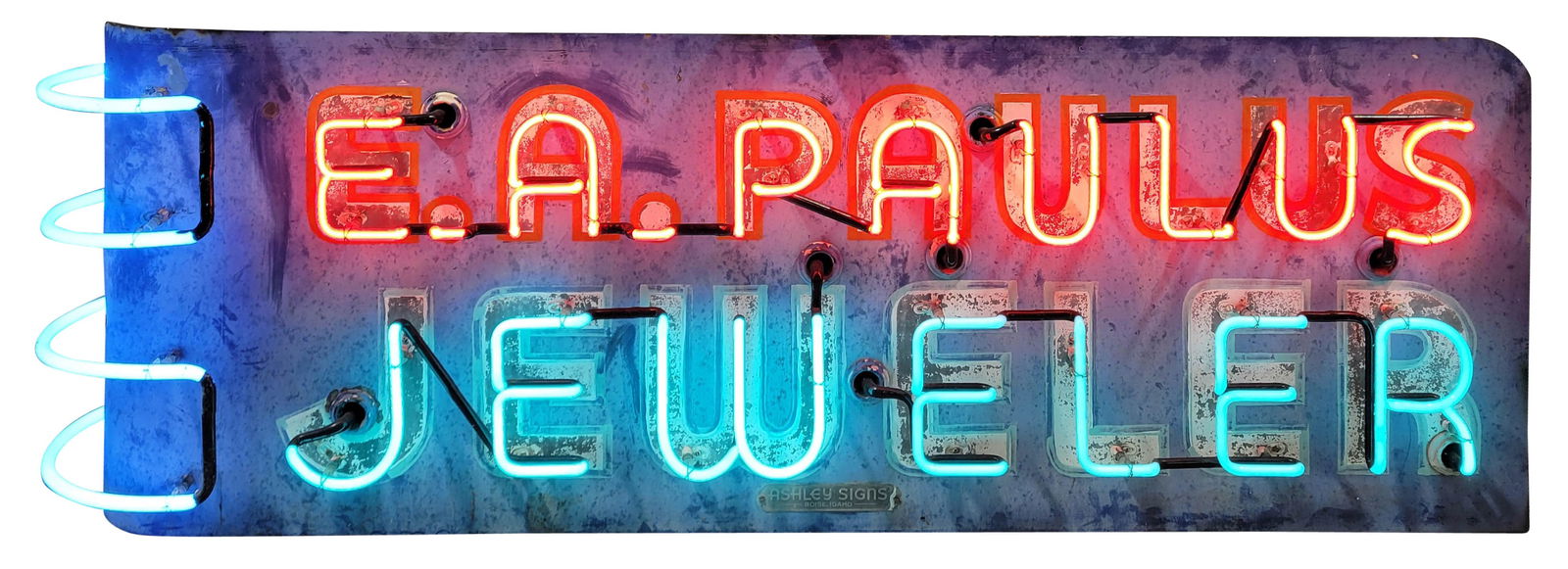 E.A. Paulus Jeweler 6.5' DST Factory Neon Sign: 23" x 78" x 13", DST factory neon sign with the original metal can works as it should. Both sides have general surface wear with paint loss and fading. The metal can is in good condition and the sign