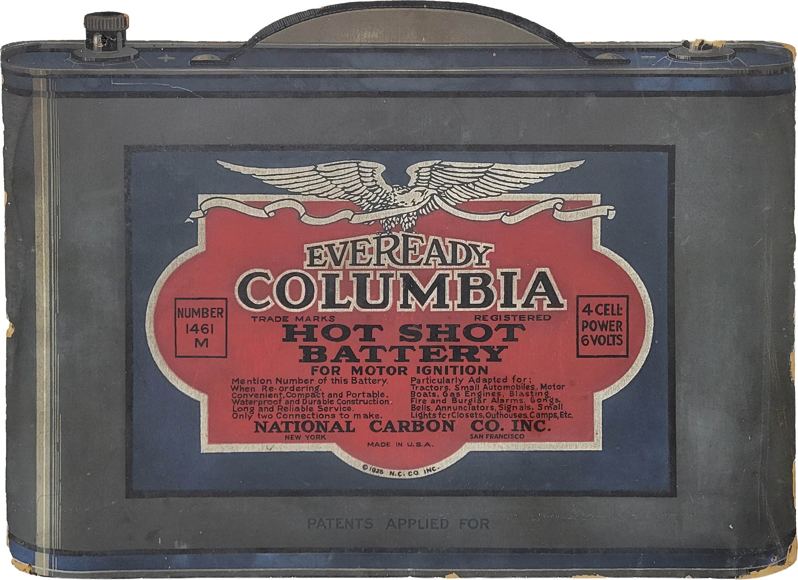 1925 Eveready Columbia Hot Shot Battery Easel Back Cardboard Sign: 25" x 18" cardboard sign features an easel back. There is light wear to the surface with small scuffs and marks in the field. The perimeter exhibits wear with paper loss and the right battery terminal