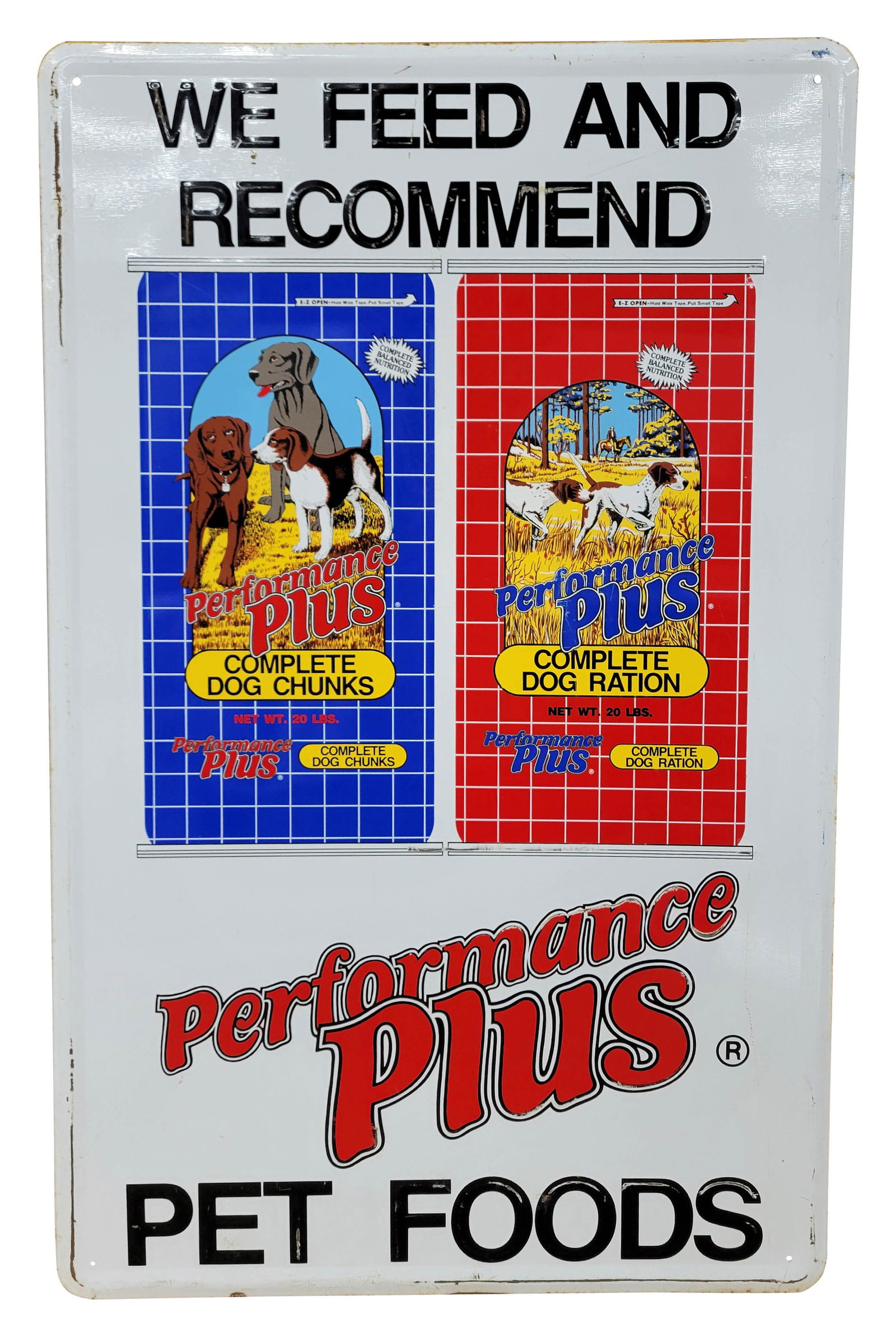 Performance Plus Pet Foods Embossed Single Sided Tin Sign: 32" x 20" embossed SST sign displays bright colors with detailed graphics. There are light scratches in the field and worn areas of some of the raised lettering. The perimeter has light wear with