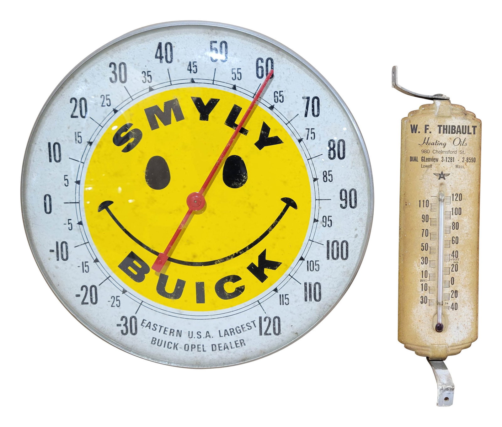 1970's Smyly Buick Opel Dealer and W.F. Thibault Flying A Thermometer: Lot of 2 includes 10" working Smyly round thermometer that features a glass face and metal can. The glass has dirt specks and the metal can is in excellent condition. 1970's. Also a working 8" tin W.F