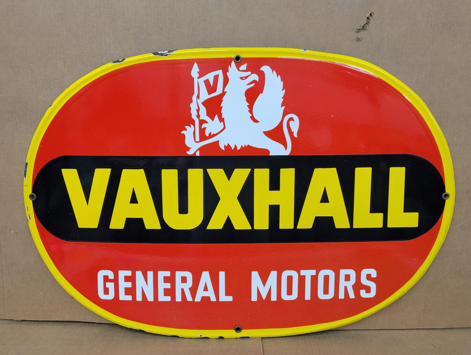 Vauxhall General Motors Single Sided Porcelain Sign: 38.5" x 25.75" self framed SSP sign exhibits excellent color and gloss with several small porcelain chips around the perimeter. Rated 8.75.