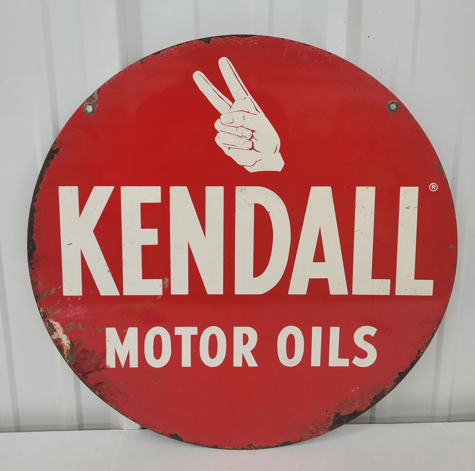 Kendall Motor Oils 24" DST Sign w/ Logo: 24" D., DST sign has good color and shine. Side #1 has surface wear in the fields with oxidation and paint loss along the edges. The reverse has additional surface wear in the fields. Both factory gro