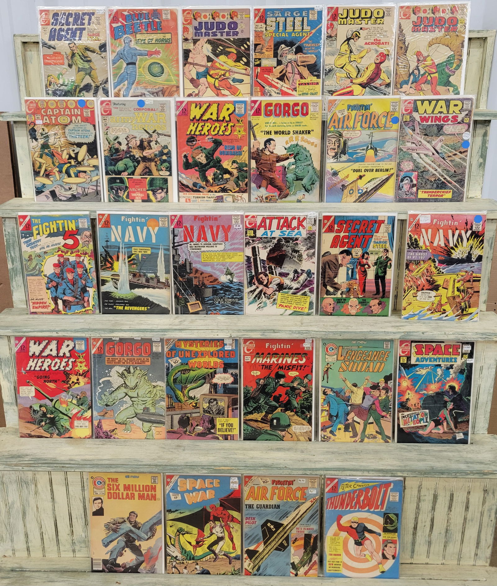26 Silver Age Carlton Comic Books and 2 Bronze Age: 28 Carlton Comic books 26 Silver age including Secret Agent, Blue Beetle, Judo Master Sarge Steel, Captain Atom, War Heroes, Gogo, The Fightin 5, Fightin Air Force, War Wings, Fightin Navy, Attack at