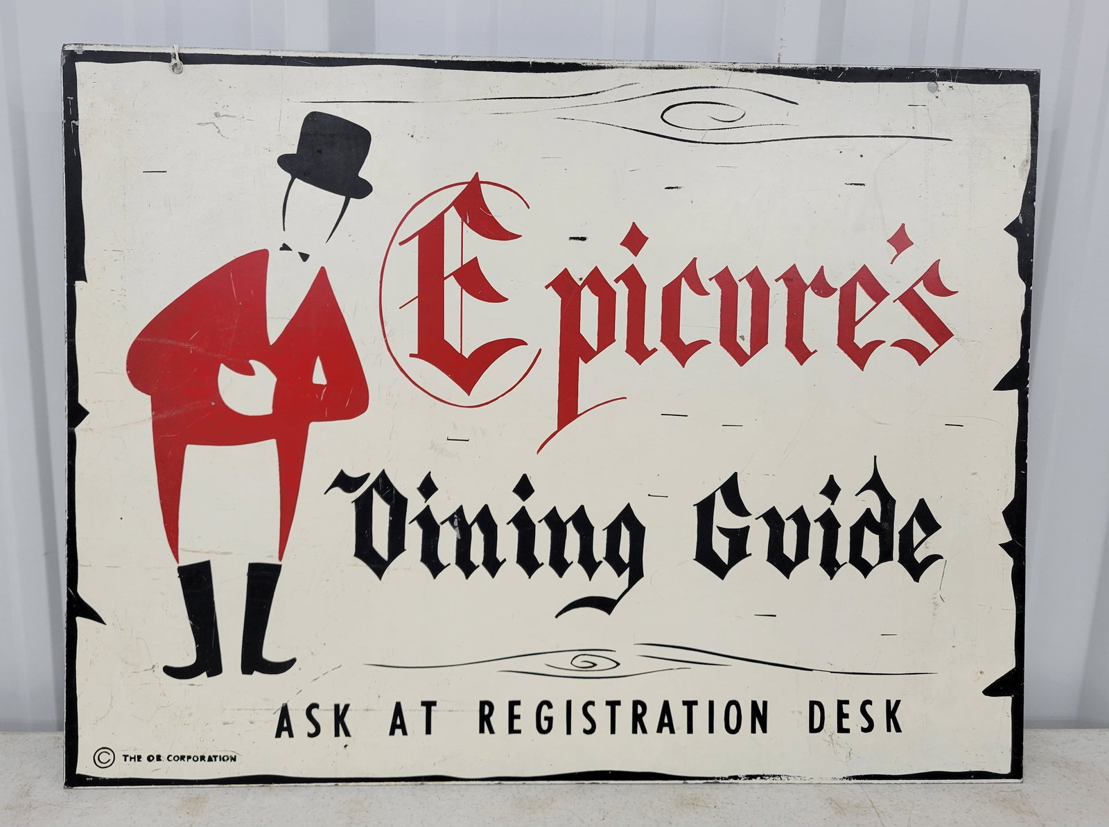 Epicure's Dining Guide Double Sided Tin Sign: 24" x 18" DST sign features a man in formal attire. The sign exhibits wear on each side with scuffs, smudges, and scratches.