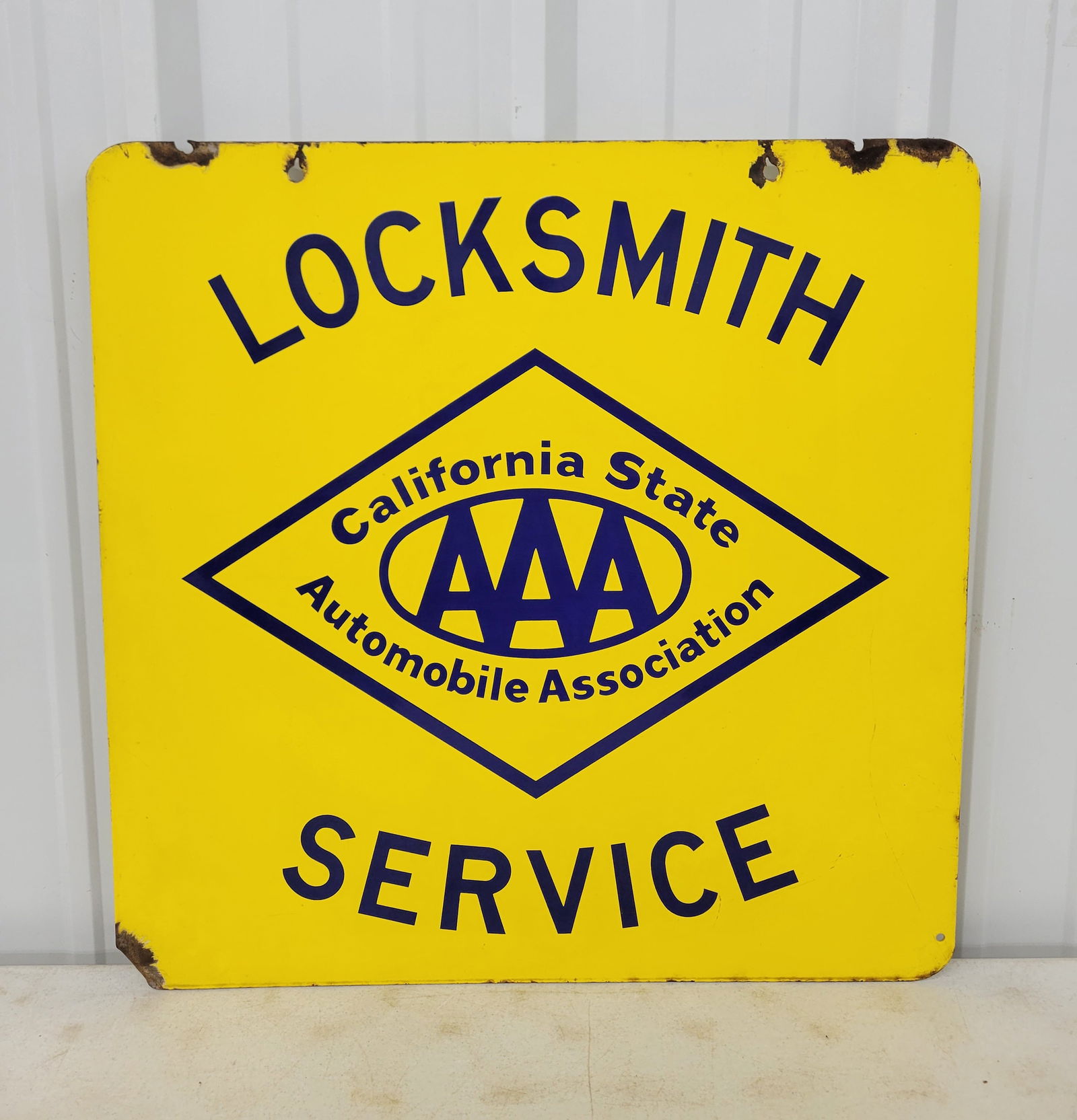 California State Automobile Association Locksmith Service Double Sided Porcelain Sign: 28" x 28" DSP sign displays bright color and high gloss on each side with some areas of faint staining in the field on one side. There is light wear around the perimeter with small chips. The top edge