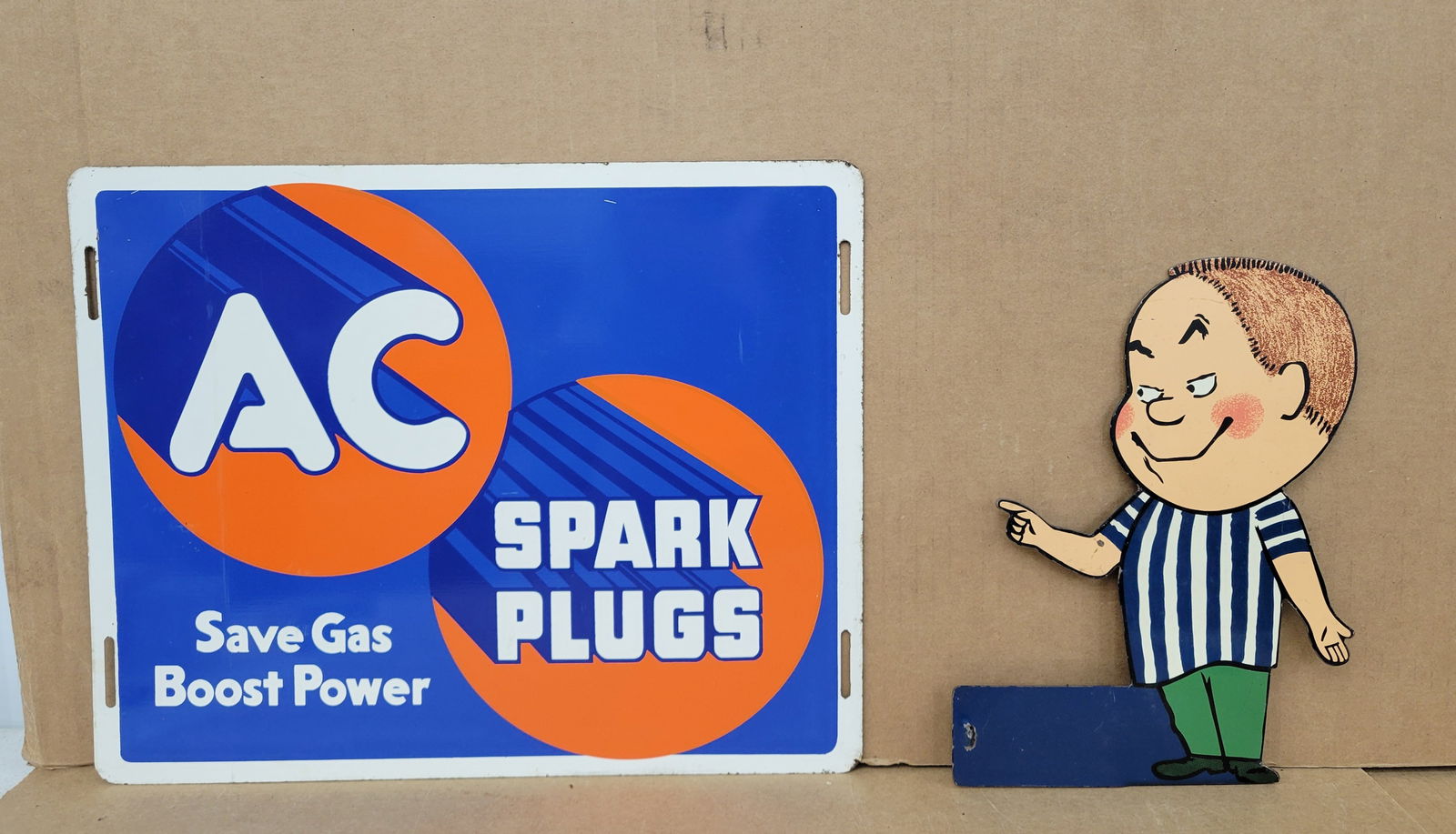 Delco Battery Boy Sign ad AC Spark Plugs Sign (1 of 2)