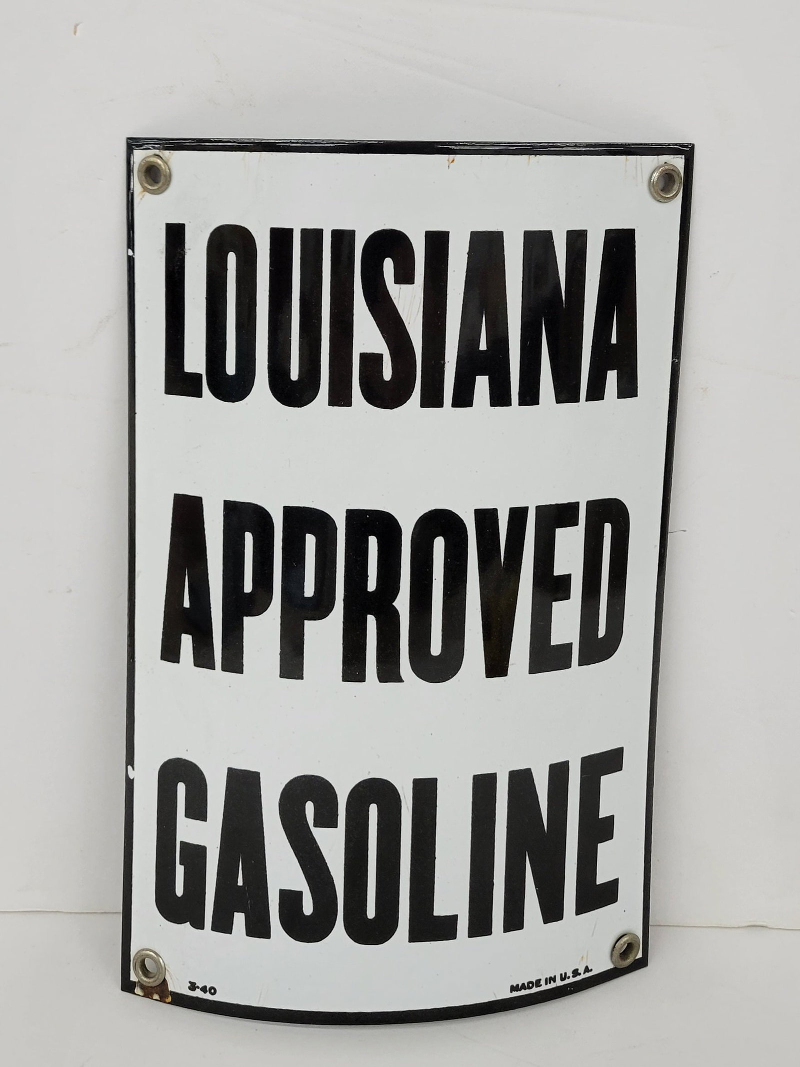 Louisiana Approved Gasoline Porcelain Pump Plate Sign: 5.75" x 9" SSP pump plate sign is in very good condition with high gloss. There are several very small areas of crazing in the porcelain and there is a small chip at the lower left mount hole. 3-40. R