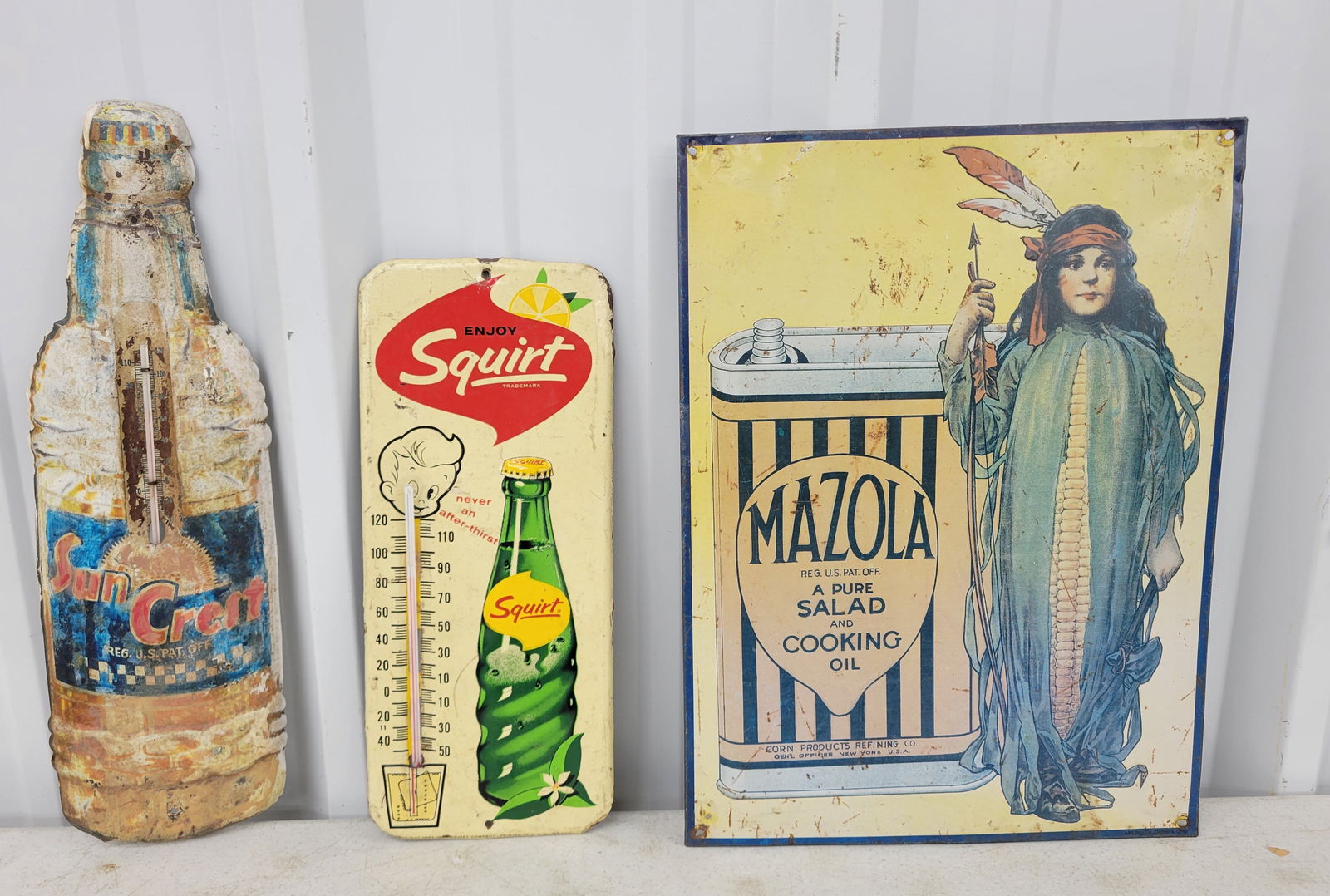 Squirt Thermometer, Sun Crest Thermometer and Mazola Sign (1 of 2)
