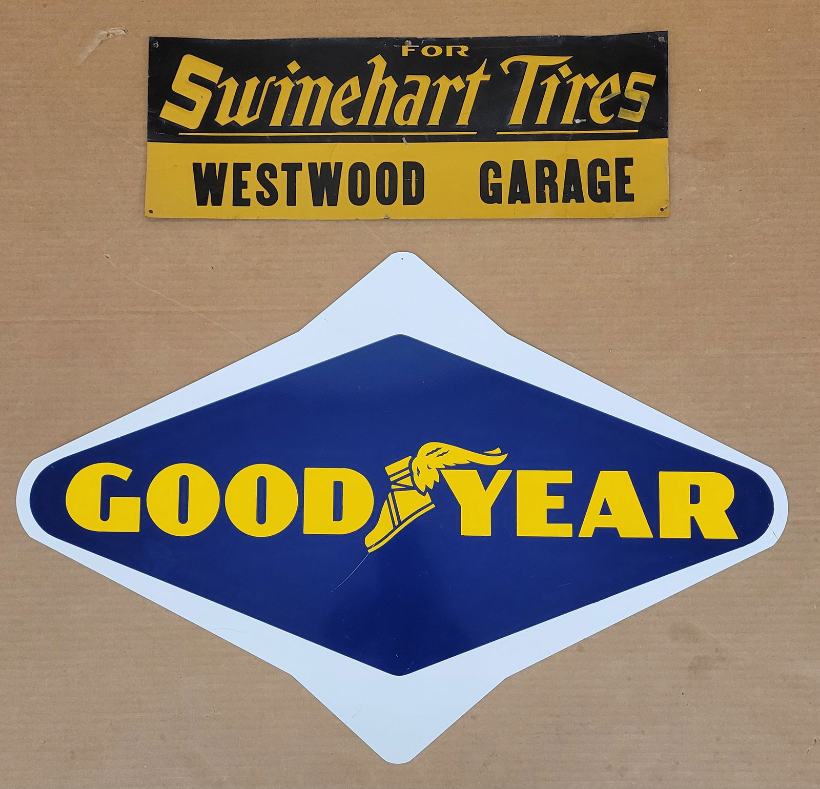 Goodyear and Swinehart Tires Single Sided Tin Embossed Signs (1 of 2)