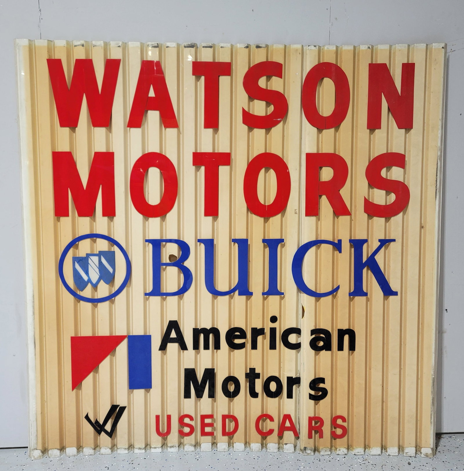 Watson Motors Buick American Motors Used Cars: 72" x 72" Ridged plastic sign with applied plastic letters. The sign displays well but is cracked in half after the "S" in Watson. ( see photos). Other cracks are present in the sign as well as some f