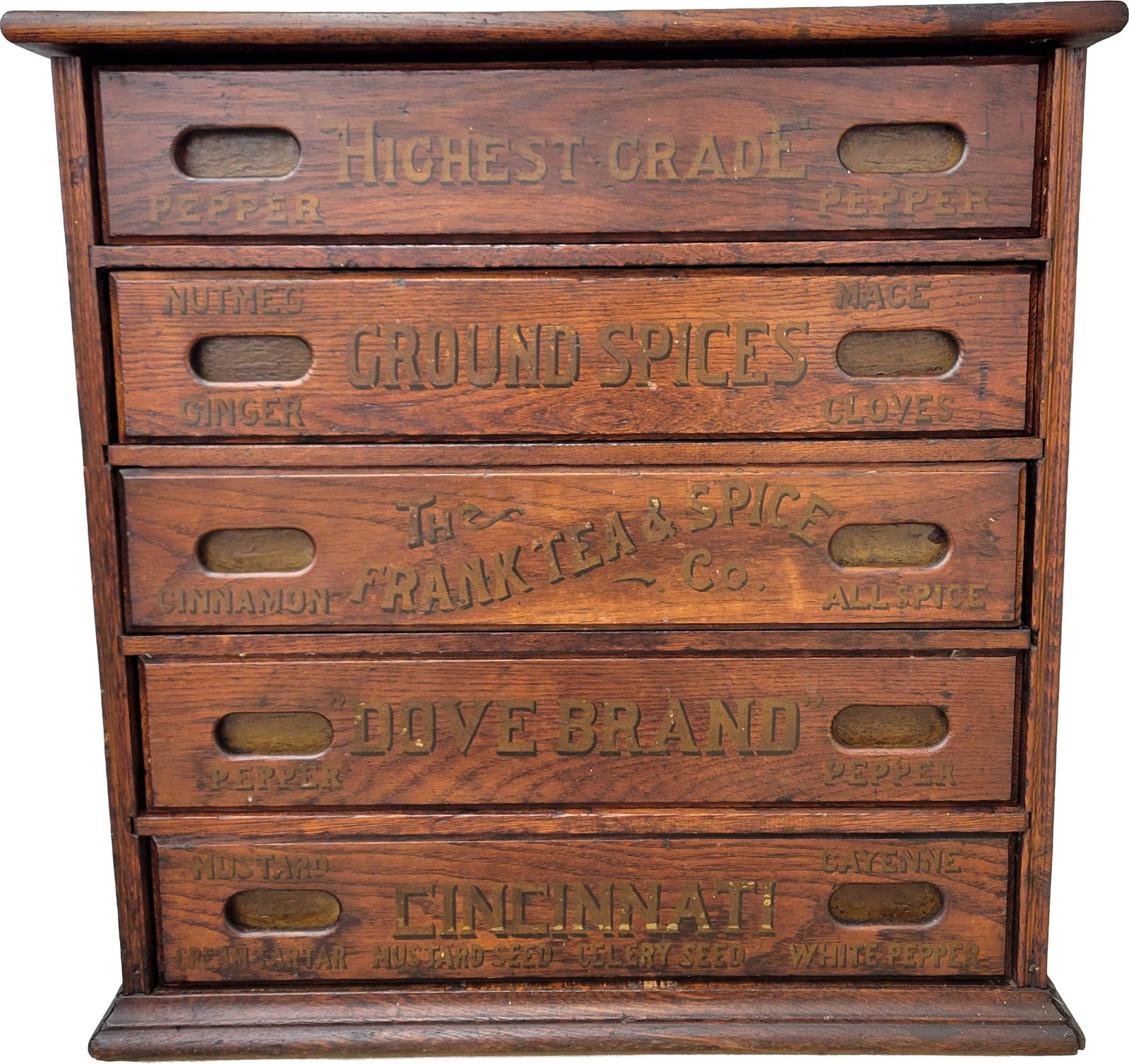 The Frank Tea And Spice Co. 5 Drawer Wood Spice Cabinet: 25.5" x 26.5" x 20" wood cabinet features 5 drawers with original painted graphics and finger pulls. The drawers read "The Frank Tea & Spice Co.,Dove Brand, Cincinnati, Highest Grade, and Ground Spice