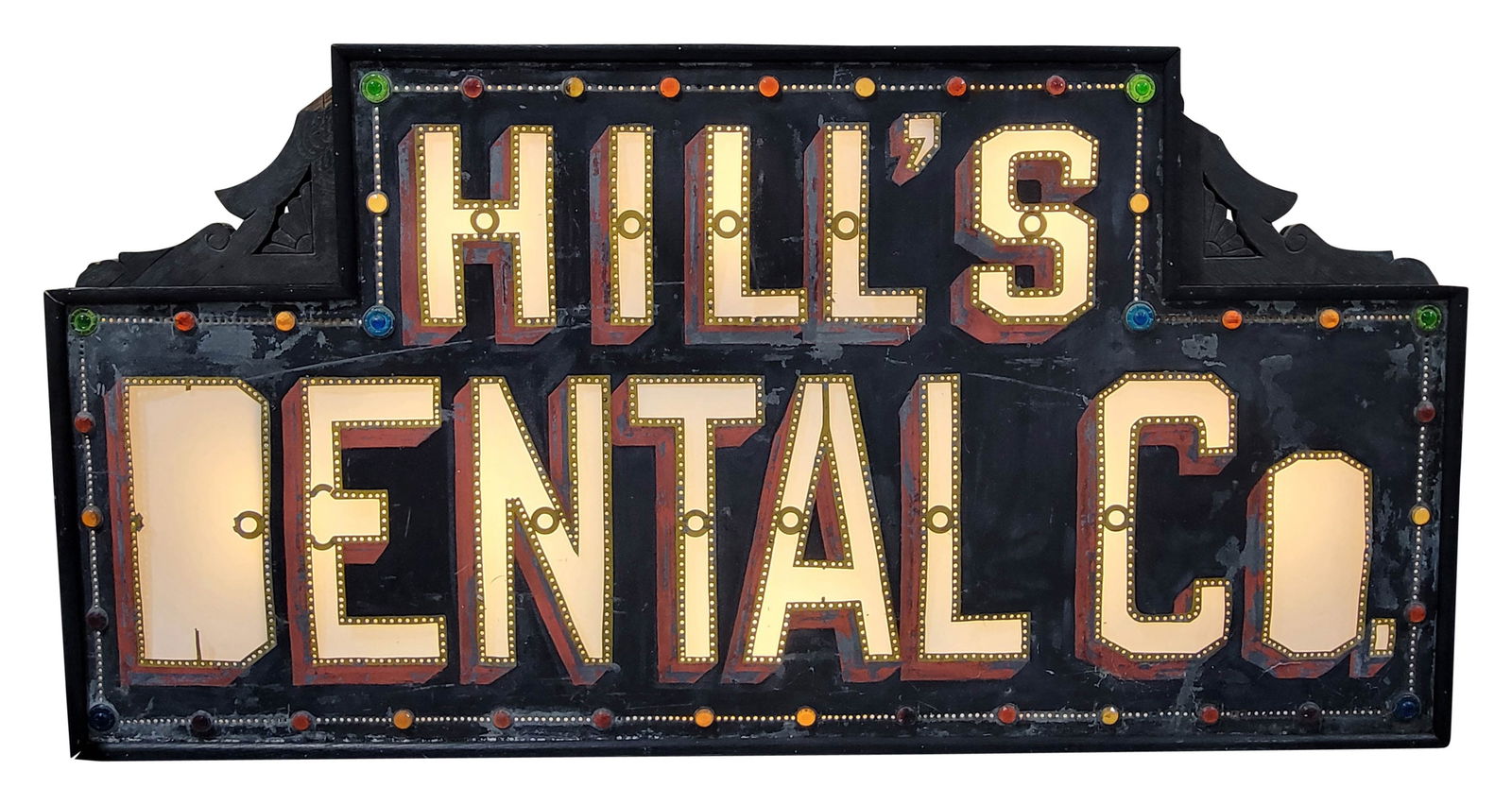 Early Hills Dental Co. 6' DST Smaltz Painted Milk Glass Sign w/ Wooden Frame: 37" x 72" x 10", DST internally lighted smaltz painted sign with milk glass letters and the original wooden can. The internal lighting works as it should. Side #1 has general wear with paint chips, ar