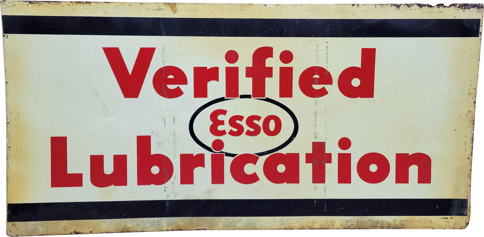 Esso Verified Lubrication 6' Single Sided Tin Sign: 36" x 72", SST sign has wear throughout. The field displays stains and scratches. The perimeter has additional wear with stains, flaked paint, rust, and small areas of missing metal. Marked A-3694-39.