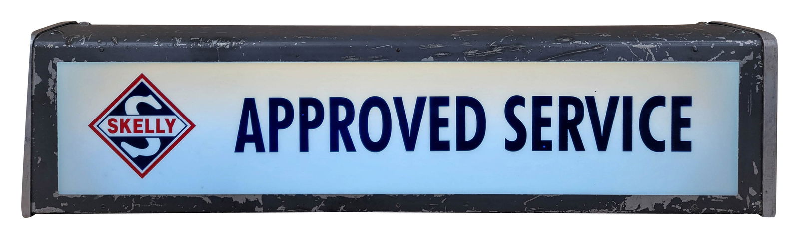 Skelly Approved Service Light Up Advertising Sign: 26.25" x 6.5" x 3.5" working illuminated sign features a plastic face with the Skelly logo and lettering with bright colors. The plastic face is in excellent condition. The metal housing has normal si