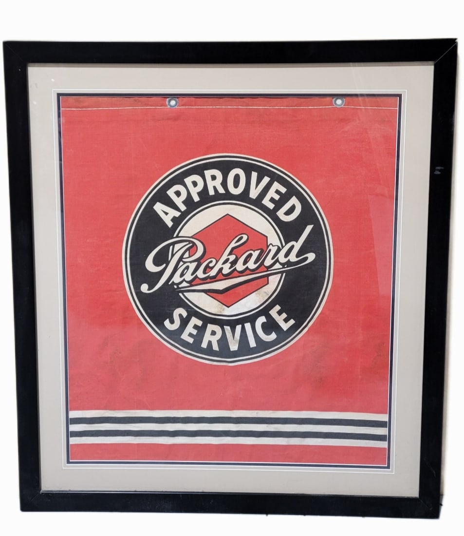 Packard Approved Service Framed Advertising Banner Sign: 34.5" x 30.5", single sided canvas banner has been framed under plexiglass. The banner has very good color with areas of soiling and discoloration in the fields. The perimeter has minor discoloration