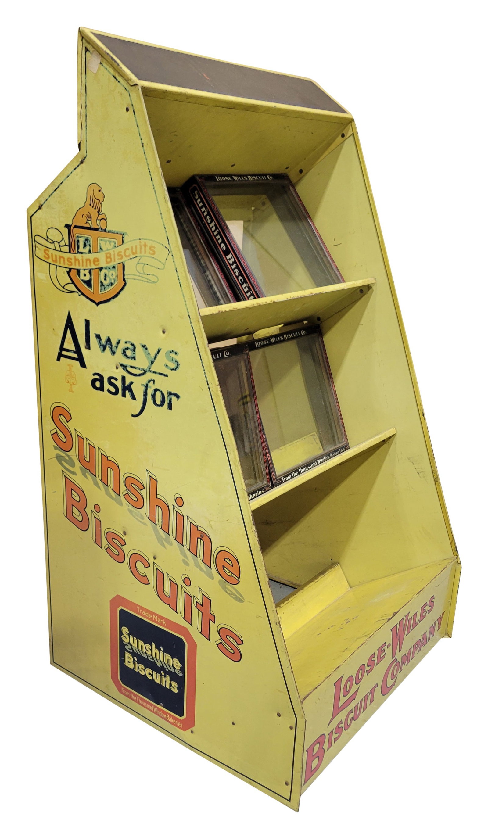 Loose Wiles Sunshine Biscuits Metal Cabinet Store Display: 19.25" x 35" x 18.5" metal shelf features Sunshine Biscuits graphics on two sides, with the Loose Wiles Biscuit Company name prominently displayed on the bottom front. One side of the graphics has exp