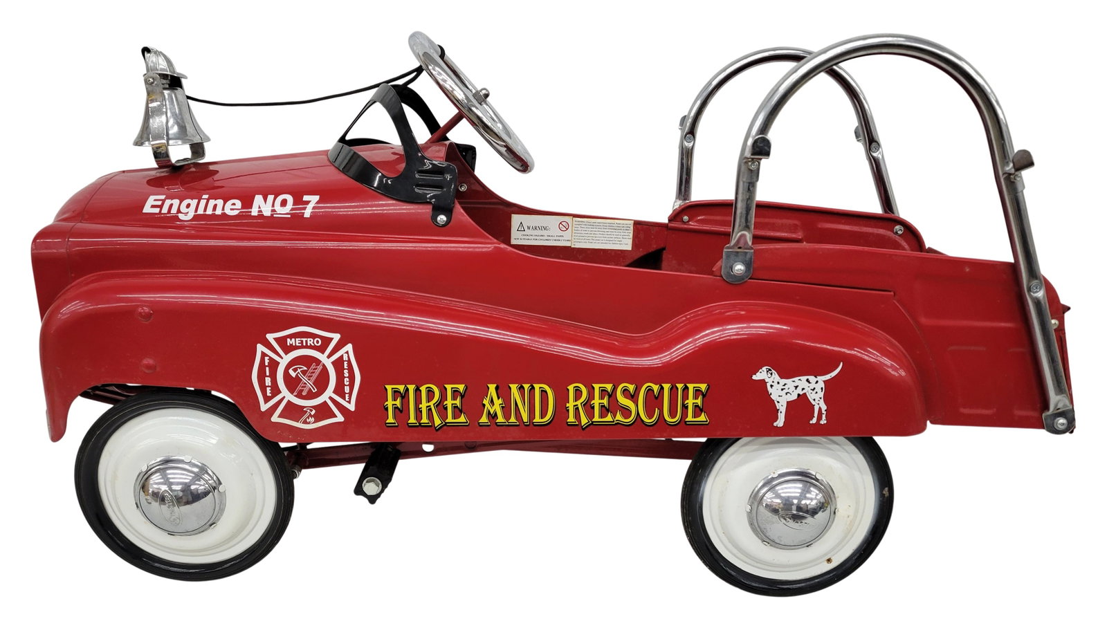 In Step Engine No. 7 Fire and Rescue Pedal Car: 39" x 15" x 21" metal pedal car is in excellent condition complete with colorful graphics and wooden ladder. There are minor scuffs. This is a modern pedal car.