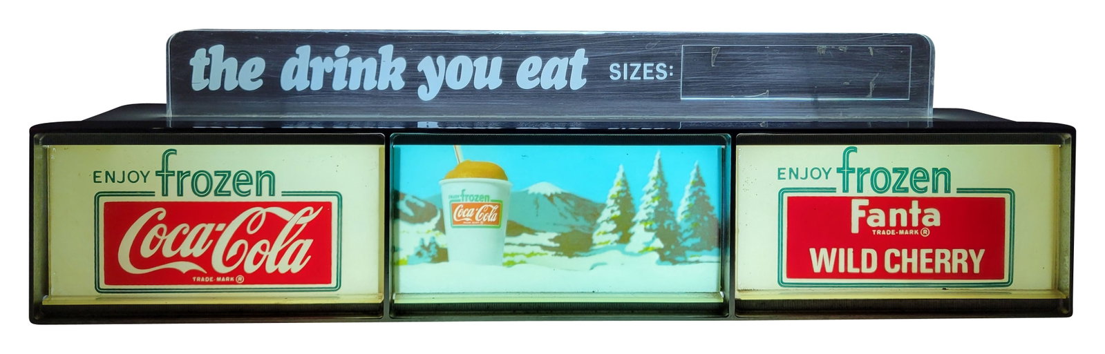 Frozen Coca Cola Frozen Fanta Wild Cherry Light Up Sign: 17" x 5" x 4" illuminated working sign is in great shape, featuring a plastic front with chrome accents and a metal casing. It shows minimal signs of wear with minor toning on the plastic. The clear p