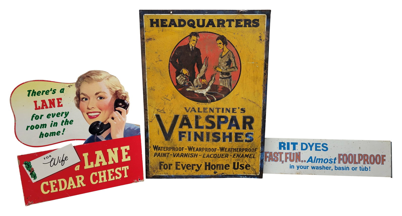 Rit Dyes, Lane, and Valspar Signs: Lot of 3 includes a 22" x 6" DST Rit Dyes rack sign, a 17.5" x 19" Lane Cedar Chest die cut cardboard sign, and a 19.5" x 27.5" Valspar Finishes SST sign. All three pieces are in used condition with h