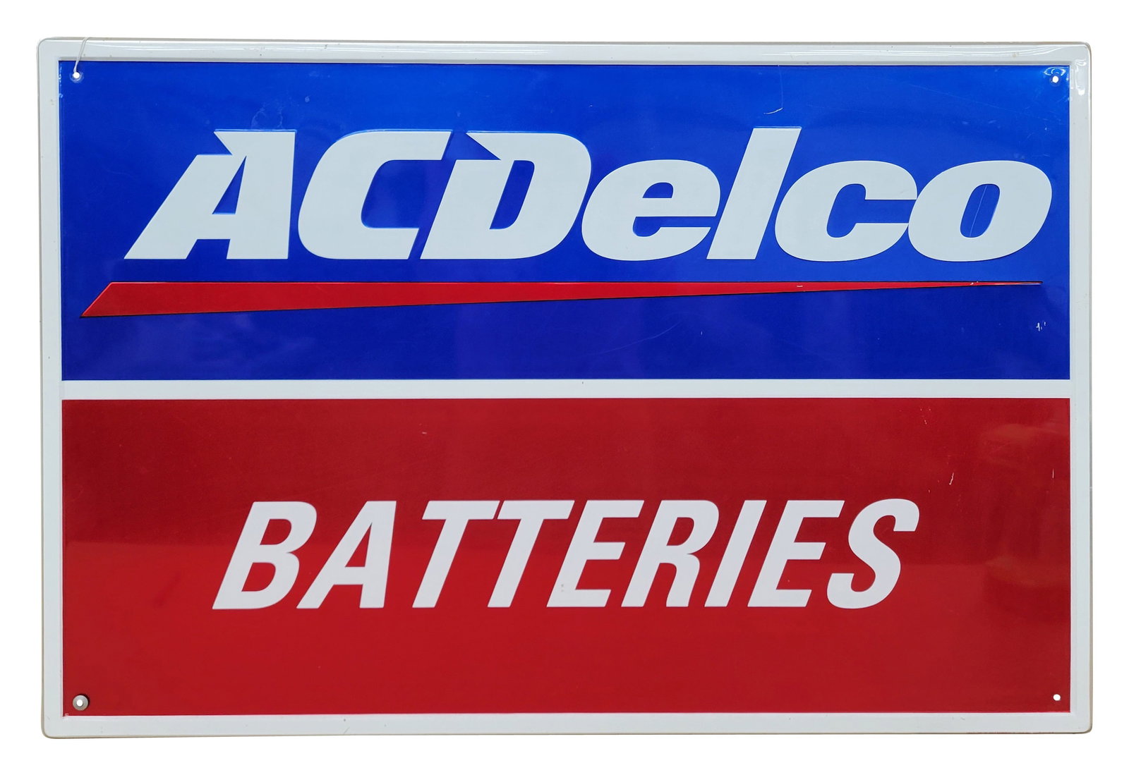 AC Delco Batteries Single Sided Tin Sign: 36" x 24" embossed SST sign is in excellent condition with bright colors and high shine.