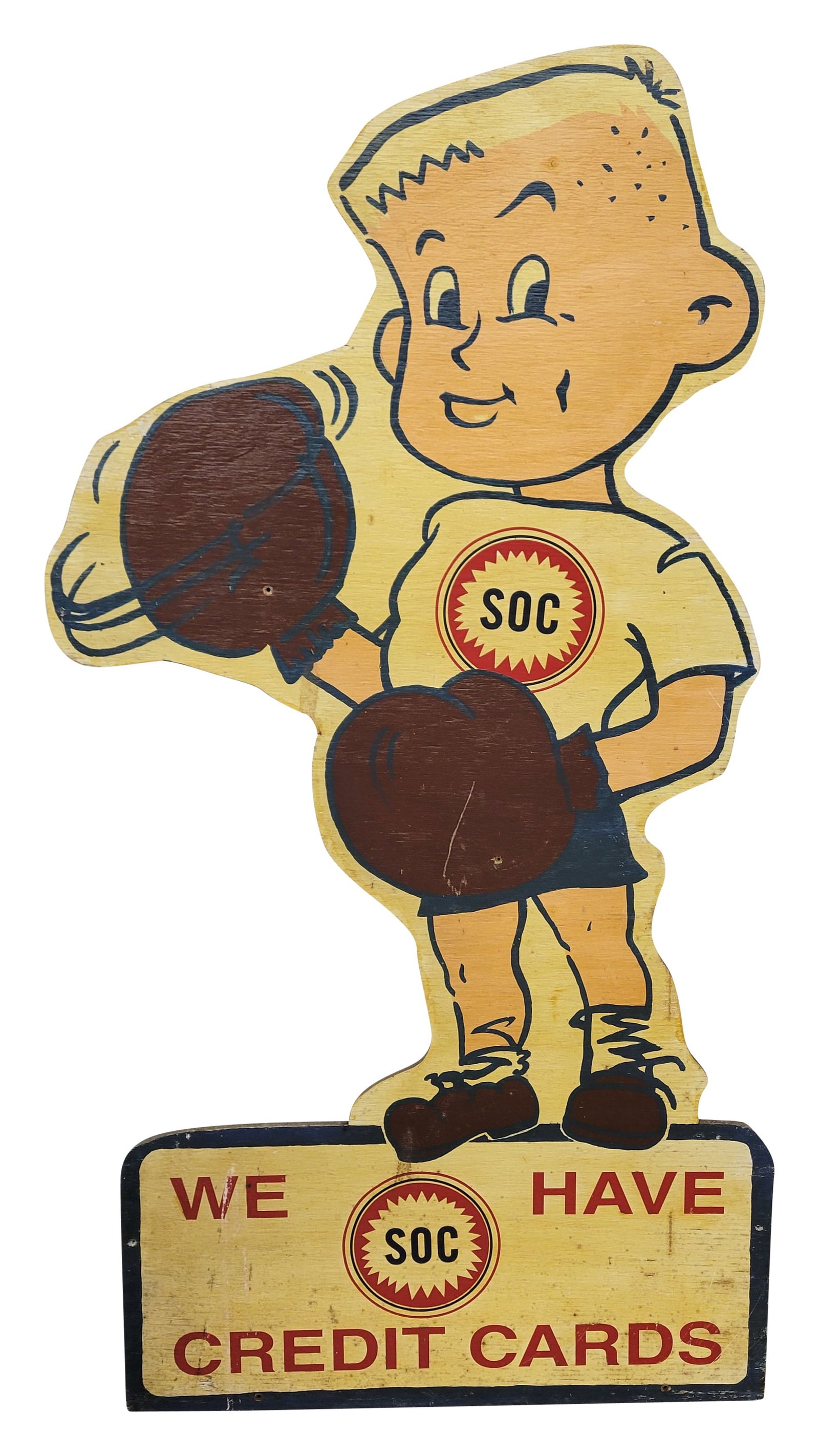 SOC Southern Oil Company Credit Cards Single Sided Die Cut Wood Sign: 25" x 48" single sided die cut wood sign displays good color with toning and moderate wear throughout including marks, small stains, and few scratches. There is a mount hole in each of his boxing glov