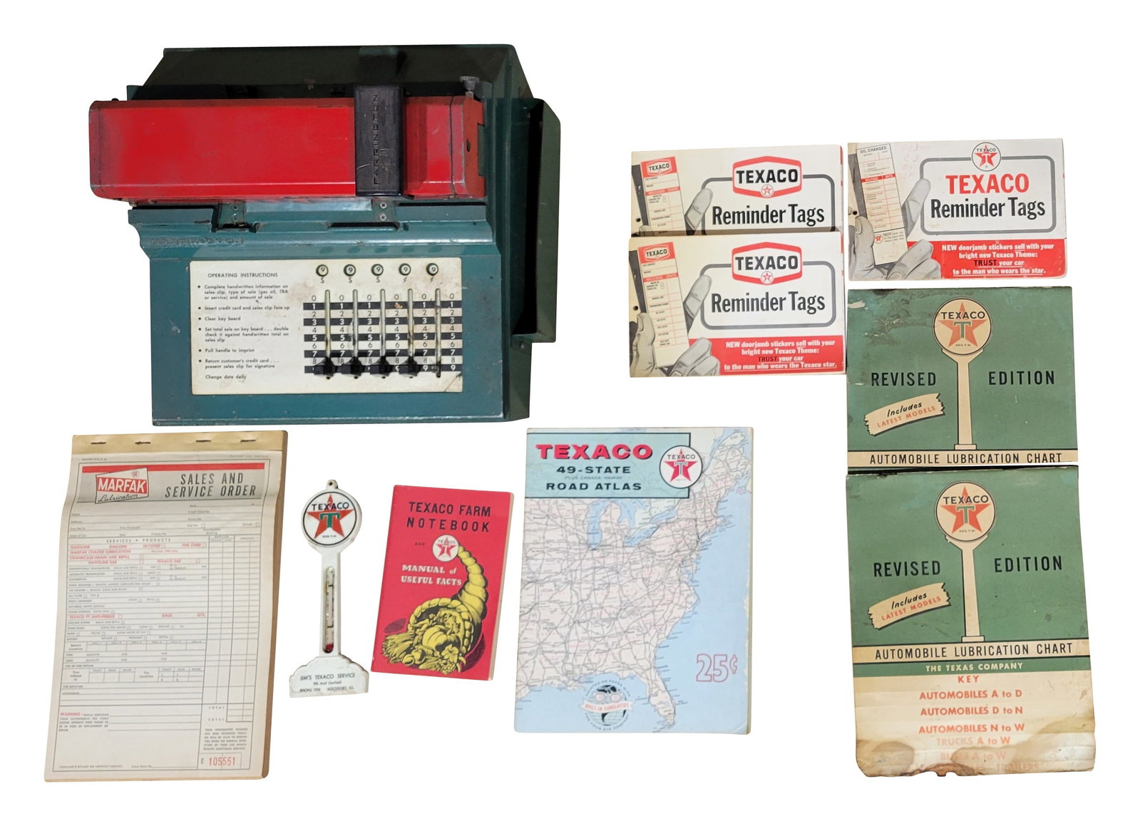 Texaco Credit Card Machine and Service Station Lot: Lot includes a 12" x 12" x 9" Farrington Texaco credit card machine with typical wear in unknown working condition. Also included are a working mini plastic Texaco thermometer, a Texaco Farm Notebook,