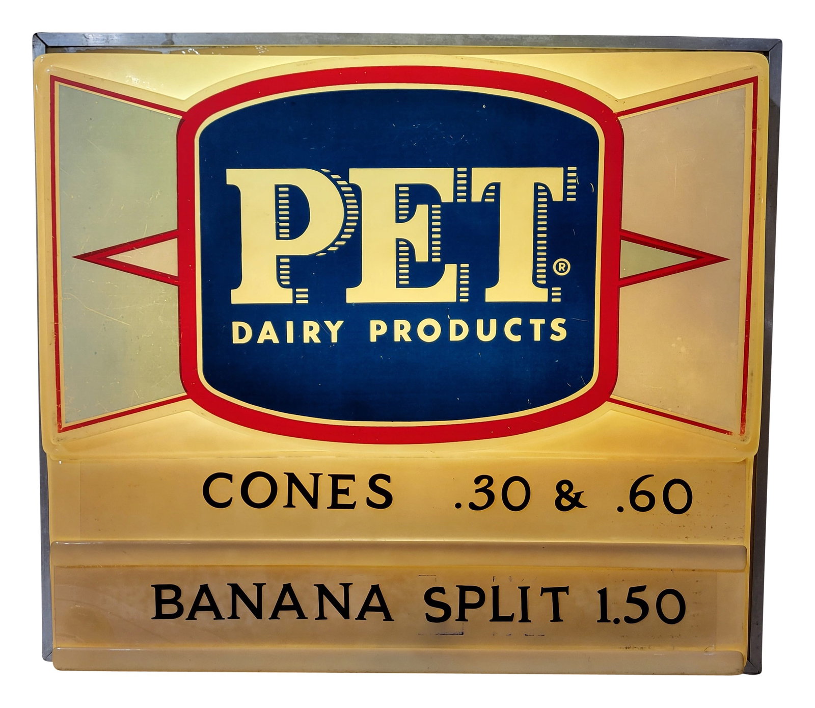 Pet Dairy Products Double Sided Light Up Sign: 21.25" x 18.5" x 16.5" illuminated double sided light up sign features an embossed plastic sign on each side with 2 clear plastic price inserts. Side one has wear with faded paint and a small crack.