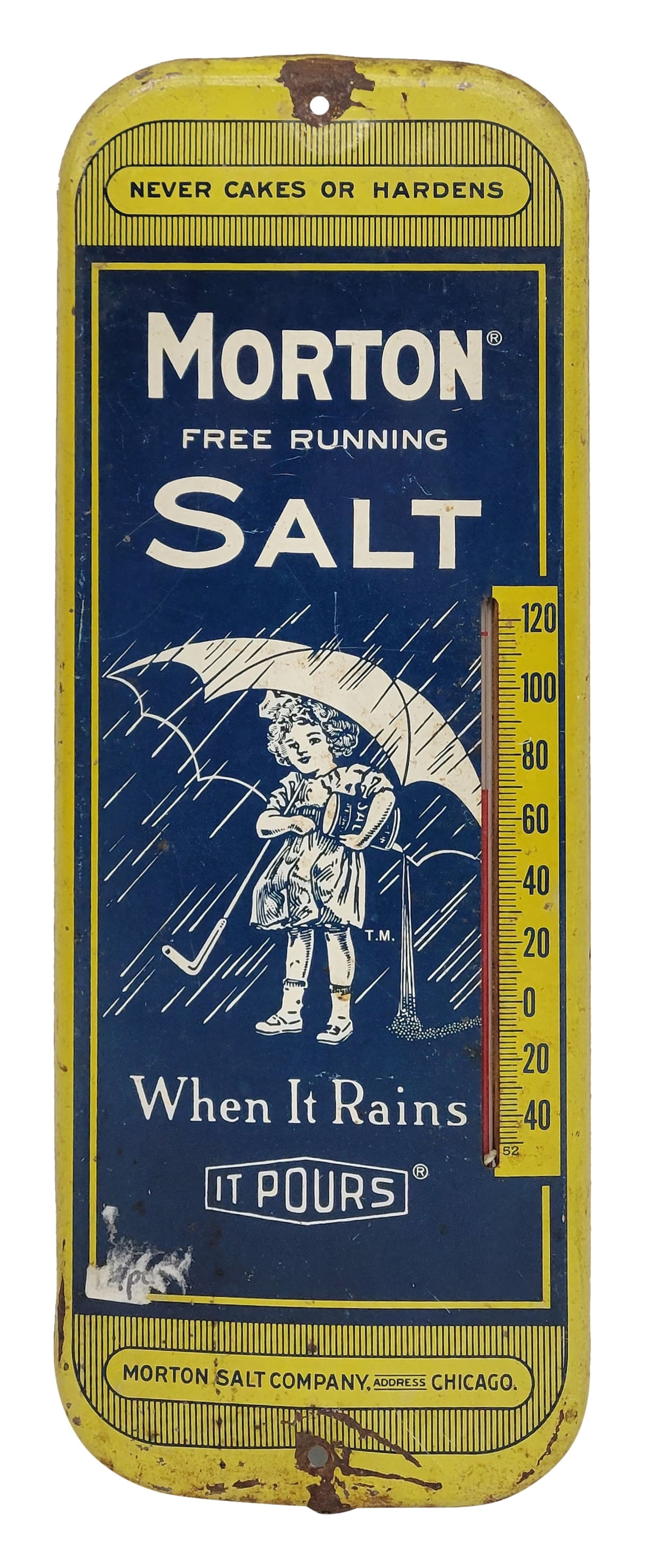 Morton Salt Thermometer: 6" x 16" working tin thermometer features the Morton Salt logo. There is wear on the surface including scratches, chipped paint, and light surface rust. The mount holes have wear with small bends.