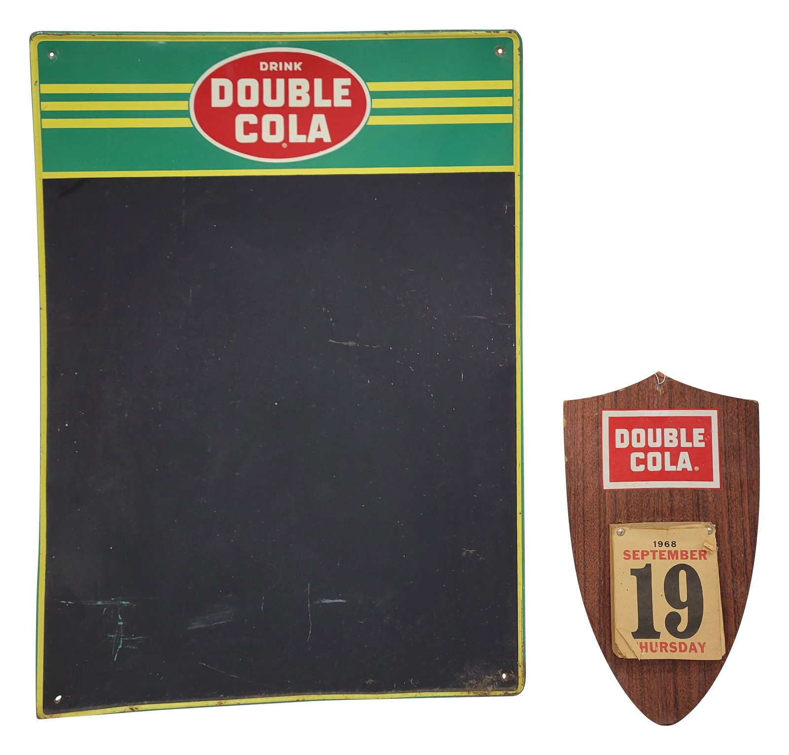 Drink Double Cola Menu Board and Calendar: Lot of 2 includes a 19.75" x 27.5" menu board that exhibits light wear in the field with small scratches. The self framed perimeter has moderate wear with flaked paint, small bends, and minor rust. Al