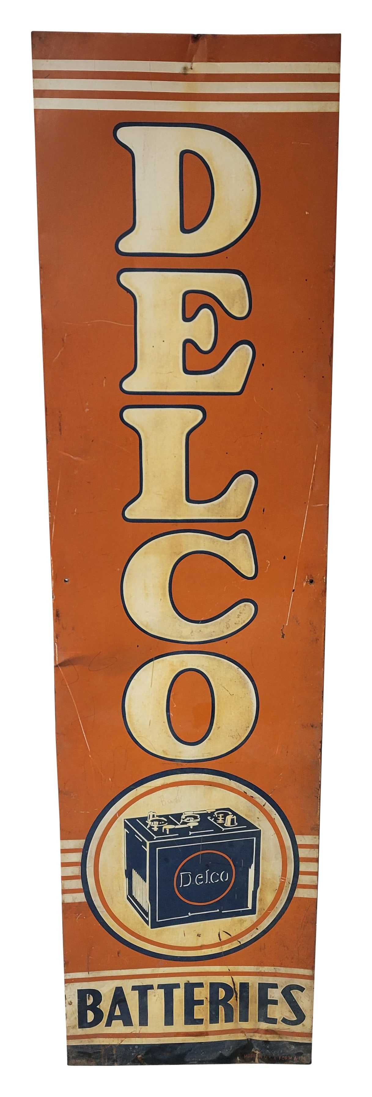 Delco Batteries SST Vertical Sign: 18.5" x 70" single sided tin sign displays age with general wear throughout including fading, scratches, holes, rust, and bends. There is a wood frame on the back of the sign.