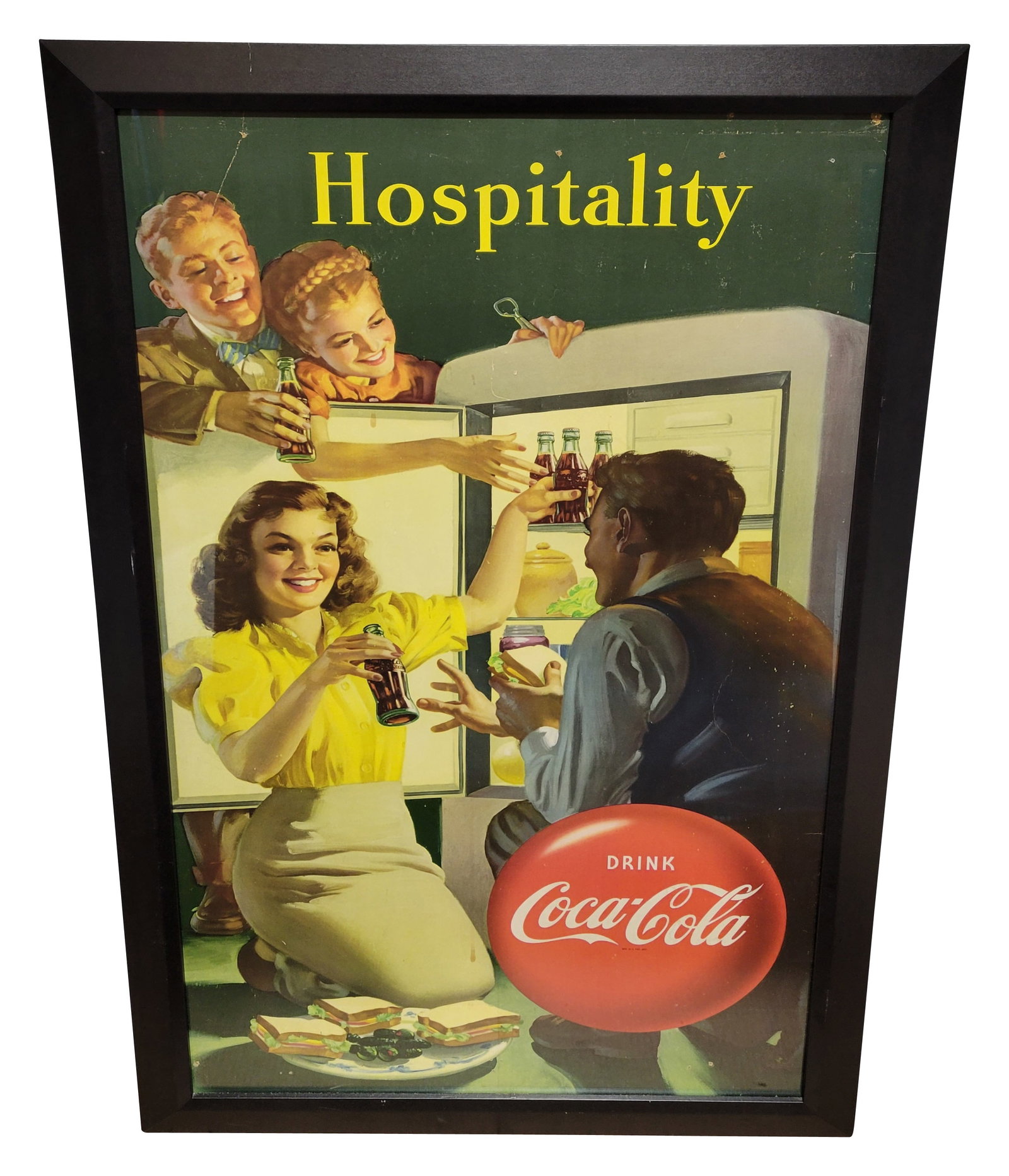 Drink Coca Cola Hospitality Framed Cardboard Sign: 32.25" x 52.75" professionally framed cardboard beneath glass features the Drink Coca Cola button logo. The cardboard exhibits good color with a few tears at the outer perimeter along with several sma