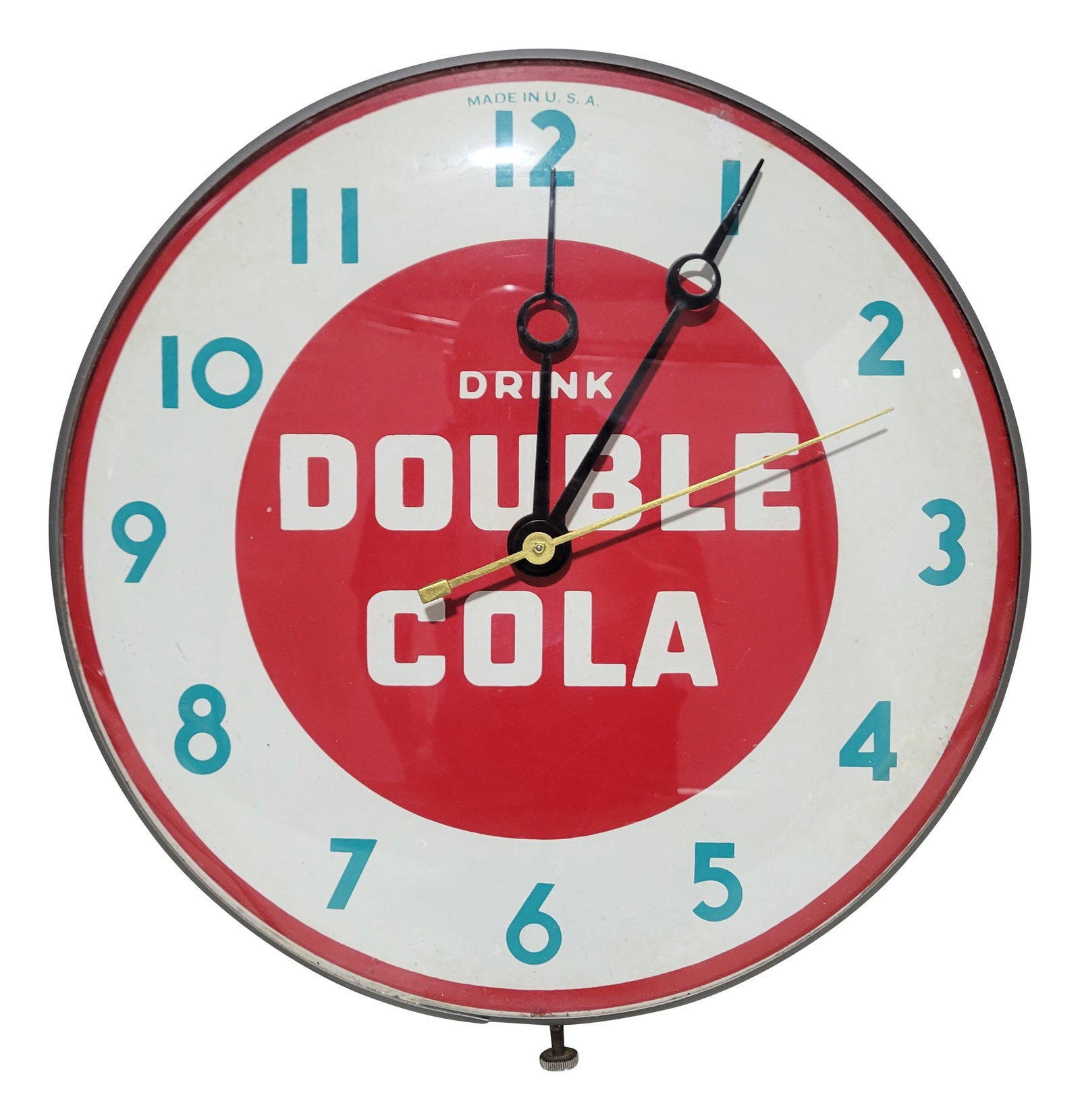 12" Drink Double Cola Advertising Clock: 12" working clock features a glass face and metal can. The clock face displays well with bright colors and the clock hands turn when plugged in. The metal can is in excellent condition.