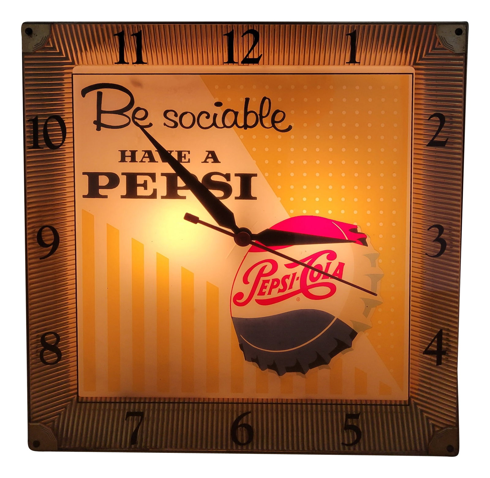 Be Sociable Have A Pepsi Light Up Advertising Clock: 15.75" x 15.75" working illuminated clock features a glass face, gold toned trim, and metal can. The clock displays well with bright colors on the inner advertising face. There is a small crack in the