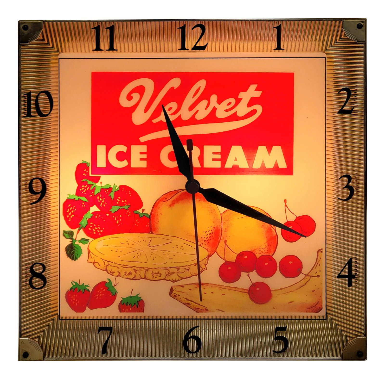 Velvet Ice Cream Light Up Advertising Clock: 15.75" x 15.75" working illuminated clock is in excellent condition with light wear around the plastic and gold colored clock housing. It features a plastic outer face and interior plastic advertising