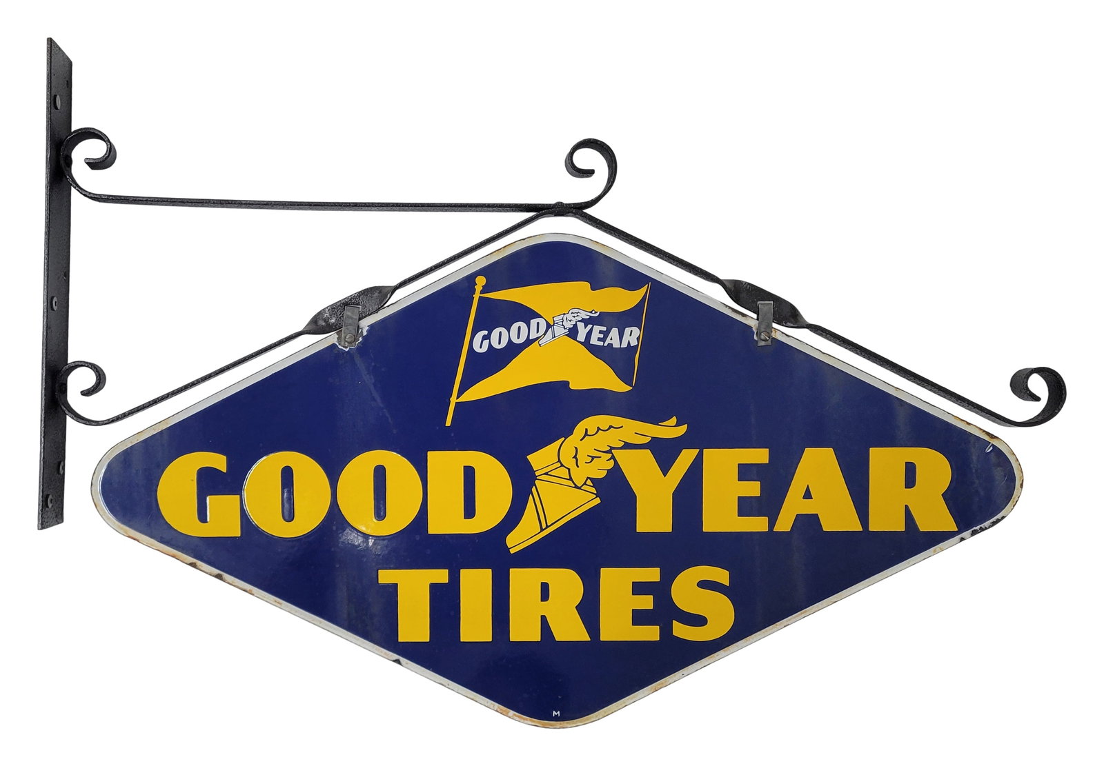 Good Year Tires DSP Sign With Hanging Bracket: 38.5" x 26" (w bracket) DSP sign features the Good Year winged boot logo. Side one exhibits good color and gloss with a small chip and the field with areas of oxidation on the surface. The reverse is 