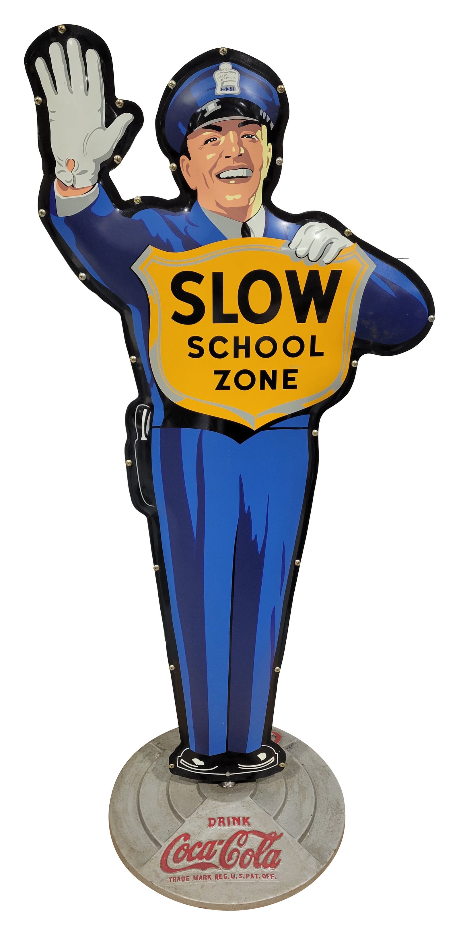Slow School Zone Coca Cola Policeman Crossing Guard Sign: 64" x 22" double sided sign features 2 modern die cut signs. One side displays excellent color and shine with Slow School Zone graphics. There is a 3" area of minor surface rust near his right elbow. 