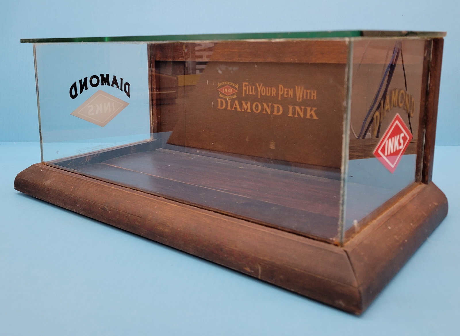 Diamond Inks Country Store Countertop Showcase: 9.25" x 7.25" Diamond Inks countertop showcase is in very good condition and displays well. The two glass sides have newer Diamond Inks decals. Original graphics are on the inner back side of the disp