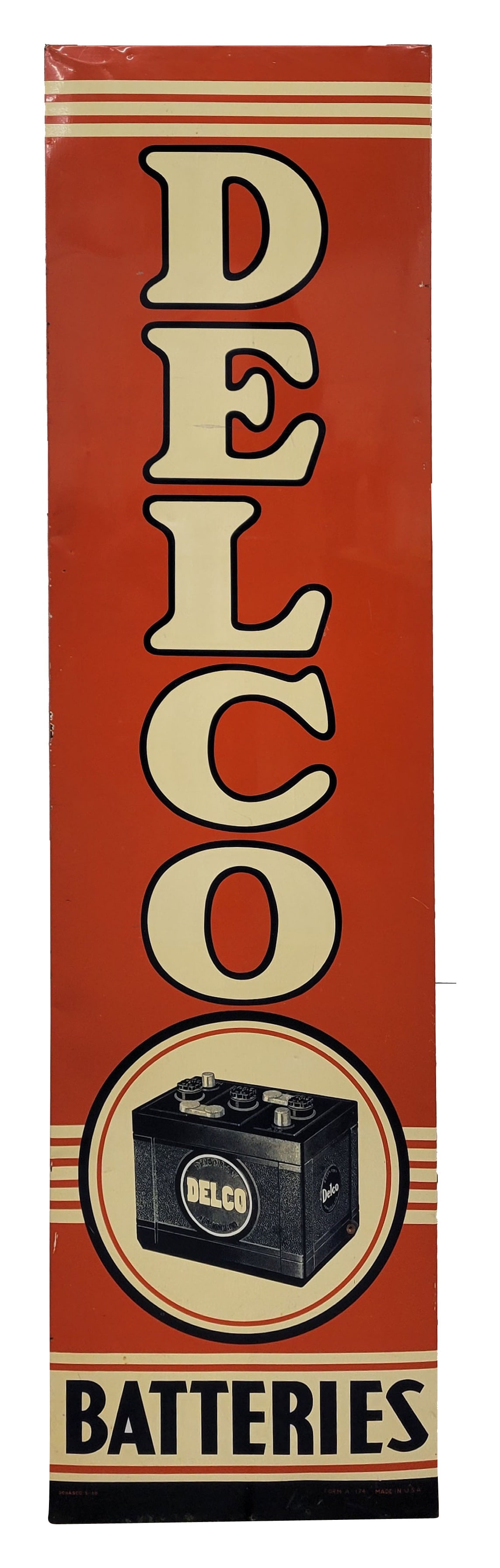 Delco Batteries Single Sided Tin Sign: 18.5" x 70.5" vertical SST sign exhibits bright colors and good shine with light wear in the field including scuffs and small scratches. There is minor wear around the perimeter with a few shallow ben