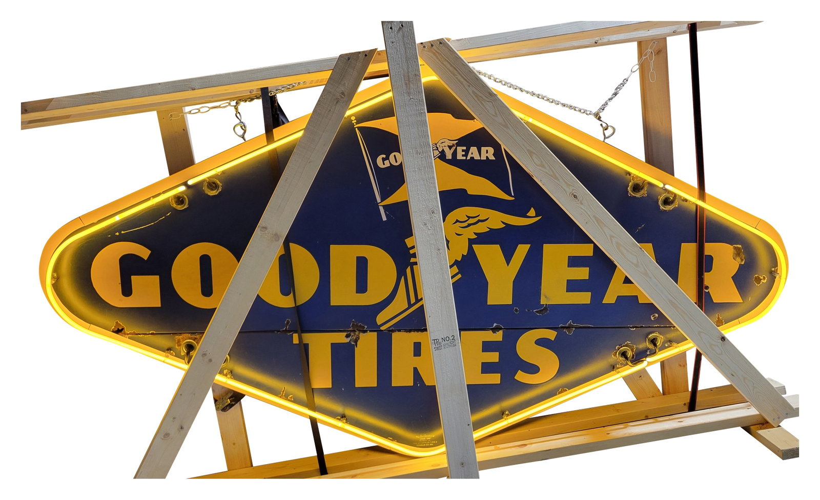 Good Year Tires 8' SSP Neon Sign w Wingfoot & Flag Logos: 52" x 96" x 8", SSP two-piece sign with added neon has good color and gloss. The display features classic Good Year colors with a neon surround. The fields have chips with small areas of metal loss an