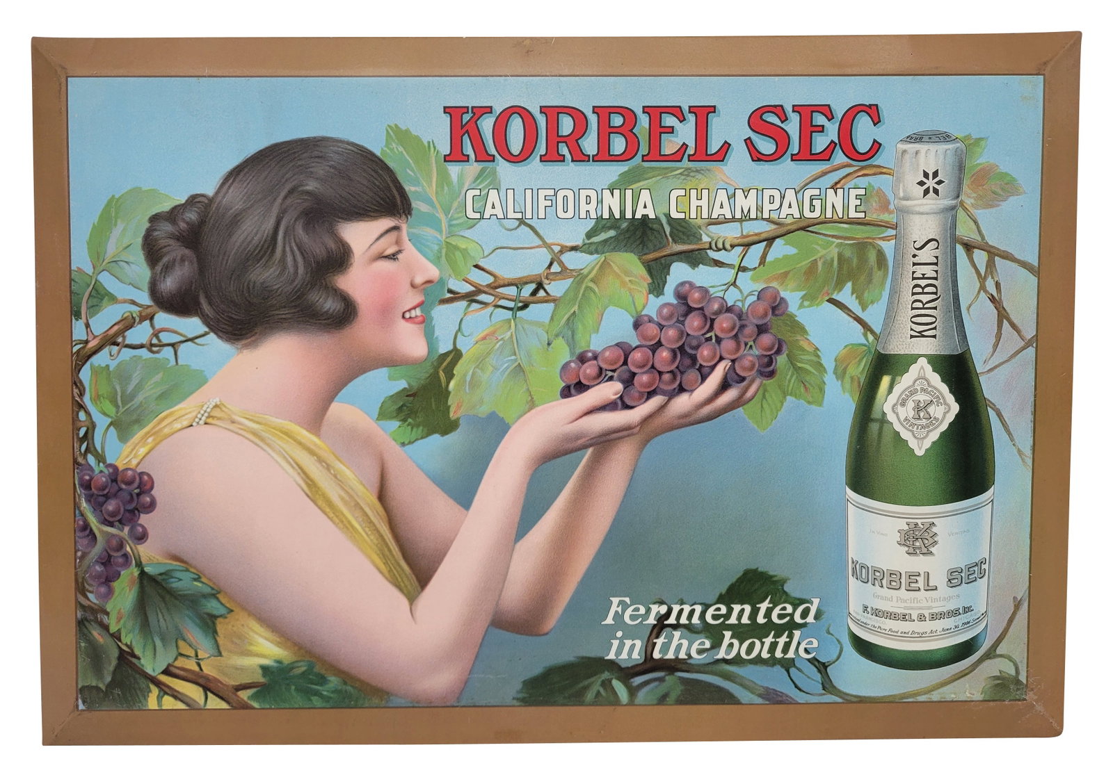 Korbel Sec California Champagne Tin Easel Back Sign: 19" x 13" single sided tin over cardboard displays very well with vivid graphics. There are a few minor scuffs along the perimeter and the lower right corner has a shallow indentation with a few fine 