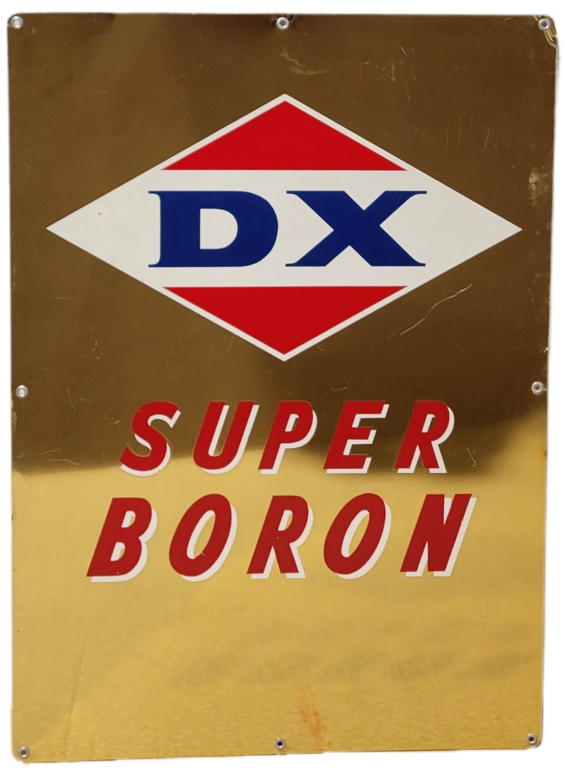 DX Super Boron SST Pump Plate Sign: 18.5" x 26" single sided tin gas pump plate sign displays very good shine and color with light scuffs and scratches on the surface. The perimeter is very clean with the exception of a minor small bend