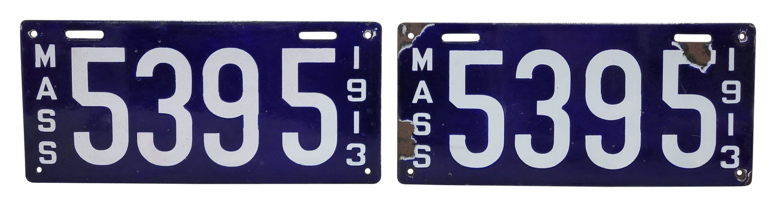 Pair of Massachusetts 1913 Porcelain Automobile License Plates: Lot consists of a pair of 14" x 5.5" porcelain car tags that exhibit good color and gloss. One tag has a chip in the field on the "5" and chips around the perimeter. The other tag has some spattered d