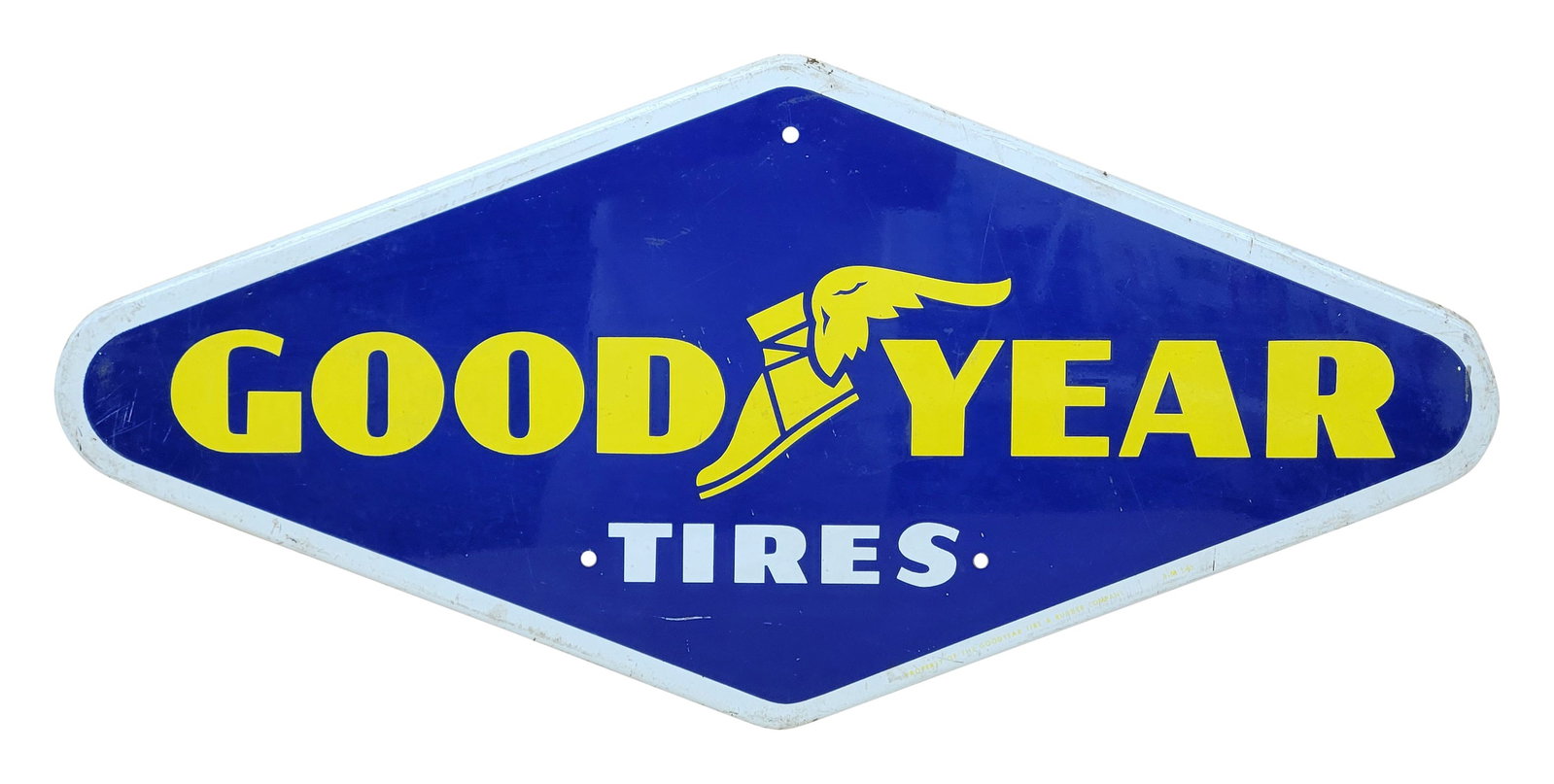 Good Year Tires Single Sided Tin Sign: 28" x 13" SST sign with logo displays good color and shine with moderate wear throughout including small scuffs and light scratches. Property of The Good Year Tire and Rubber Co.