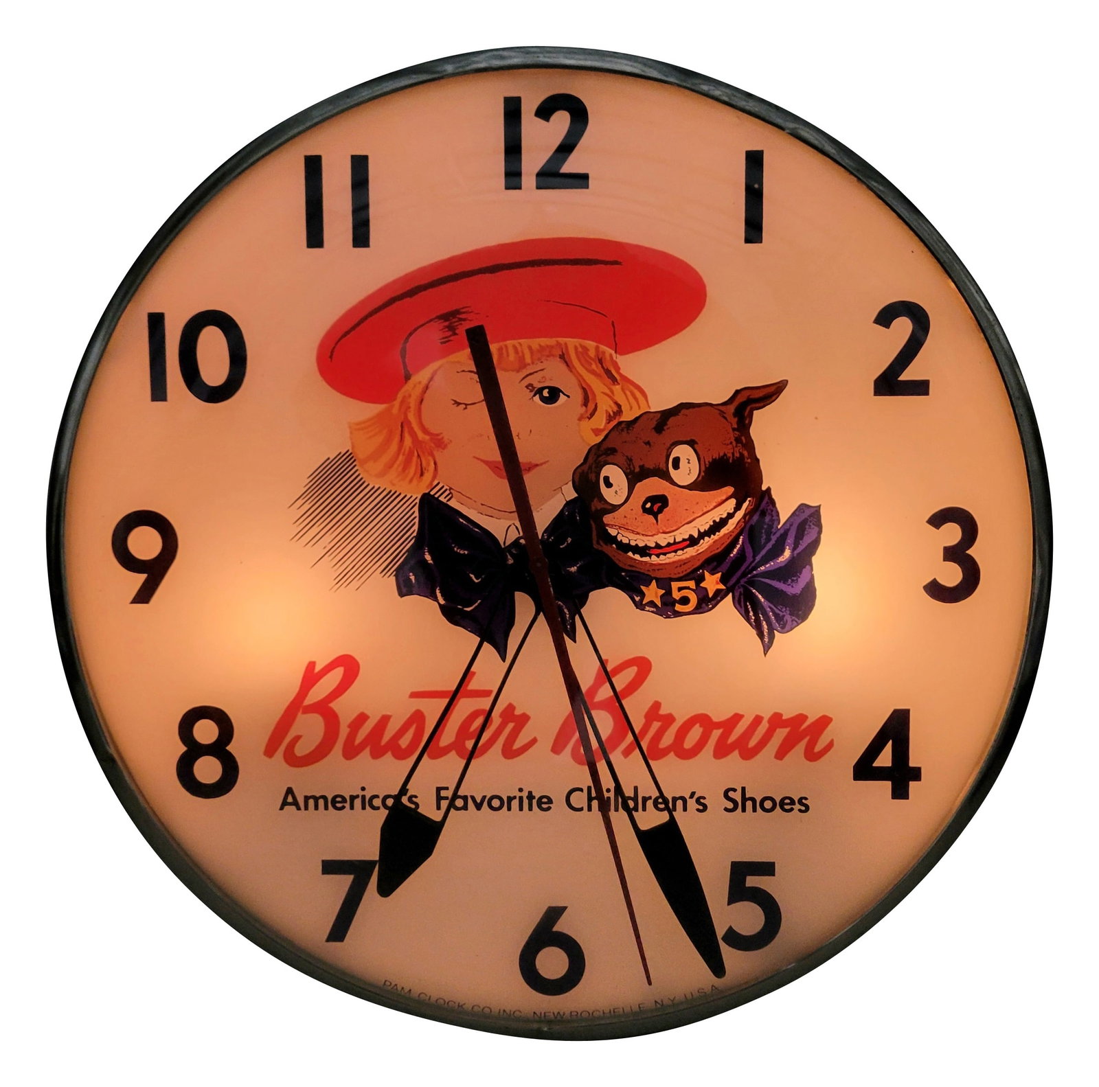 Buster Brown Light Up Pam Advertising Clock: 15" illuminated clock features a glass face and masonite can. The inner face displays well with bright color. The second hand and minute hands work when plugged in but the hour hand is loose. The out