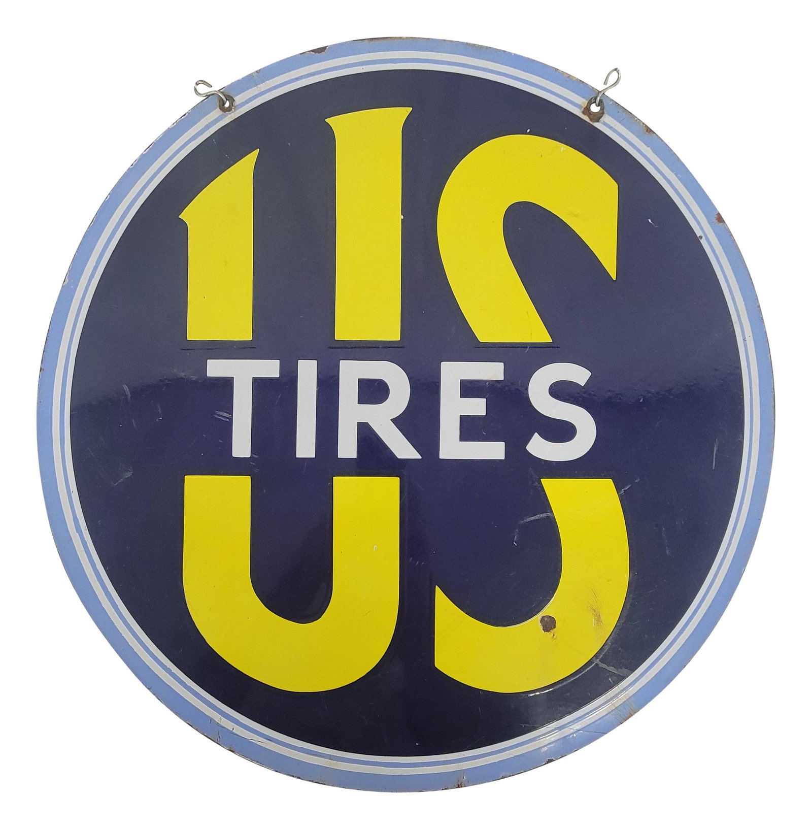 US Tires Double Sided Porcelain Sign With Hanging Bracket: 24" DSP sign exhibits strong colors and a high gloss finish on both sides with one side displaying scratches and a chip in the lower area. The reverse side features more significant scratches, along w